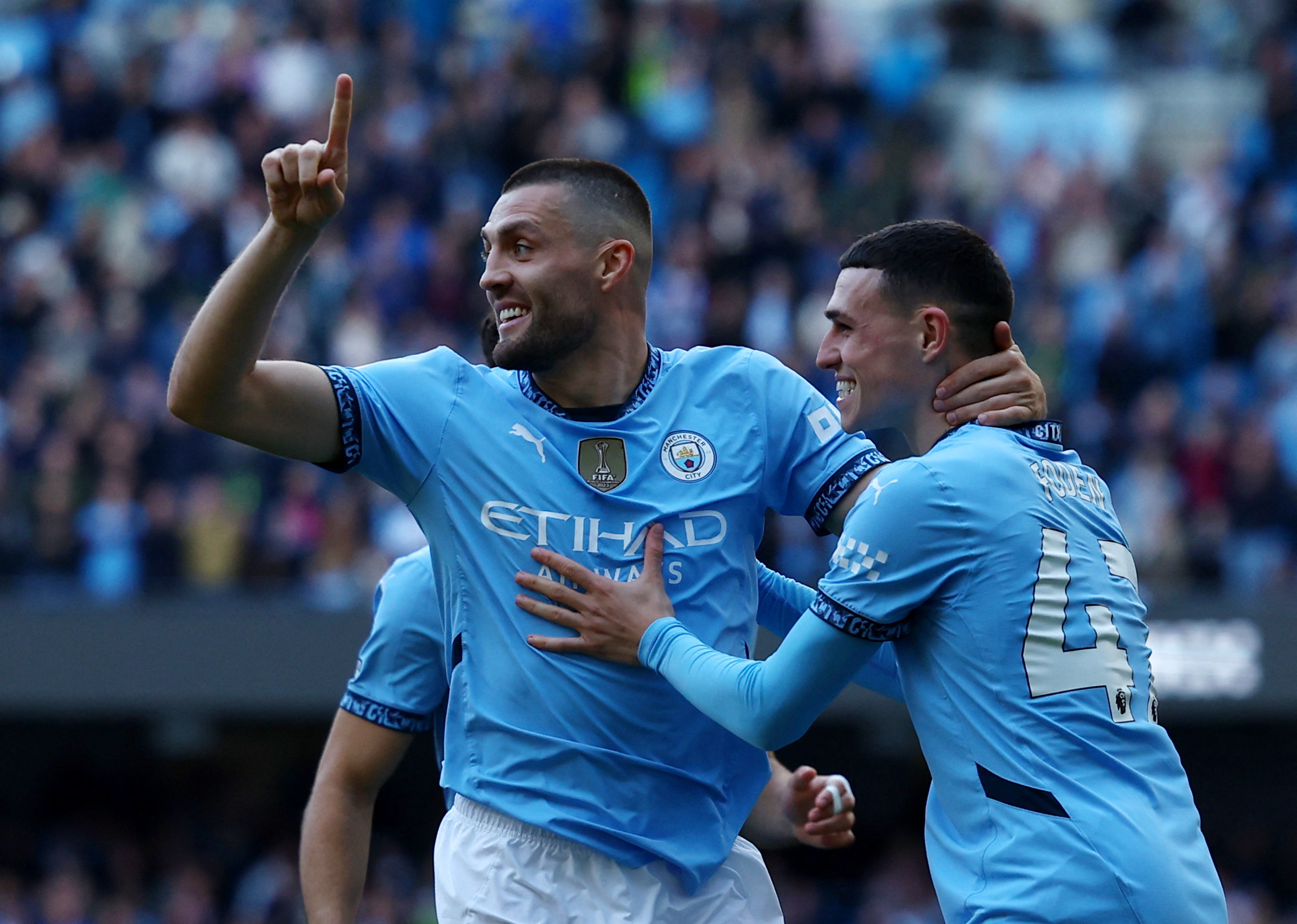 Mateo Kovačić i Phil Foden/Foto REUTERS